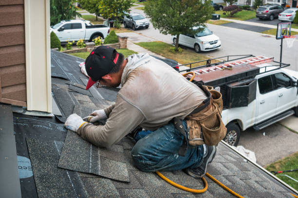 Professional Roofing technician working in Cogan Station, PA